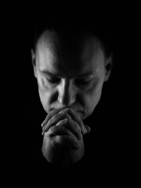 istock Male caucasian praying 889496674