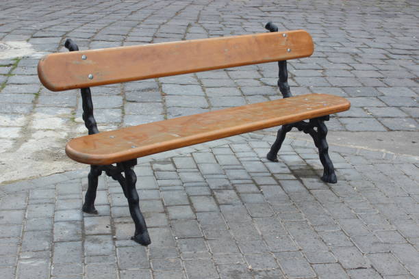 istock Bench in city park 889506920