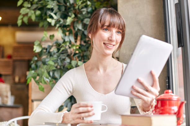 istock Young woman in coffee shop 889513428