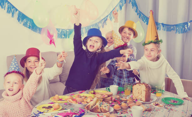 istock kids having a good time at a birthday party 889513504