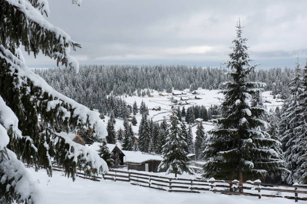 istock Snow covered mountain wooden hut 889522520
