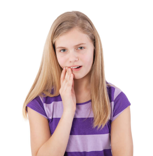 istock girl with toothache 889534192