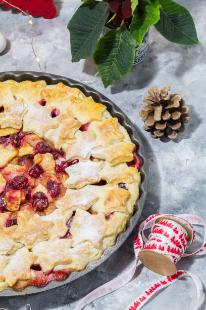 istock Apple cranberry pie. White and red background. Christmas decoration. 889534486