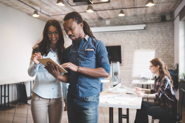 istock Company coworkers working in office 889536580
