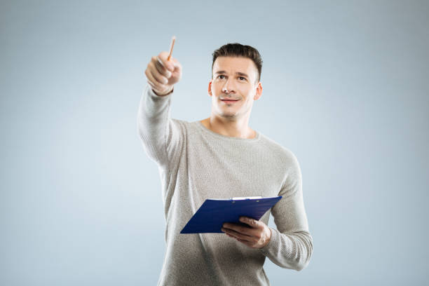 istock Handsome male person looking forward 889536658