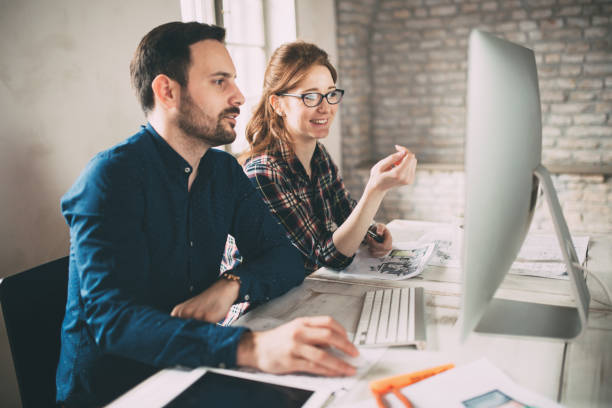 istock Company employees working in office 889538498