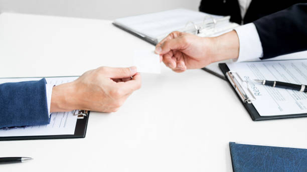 istock Businessman Talking To Candidate While Sitting At Office Table 889544392