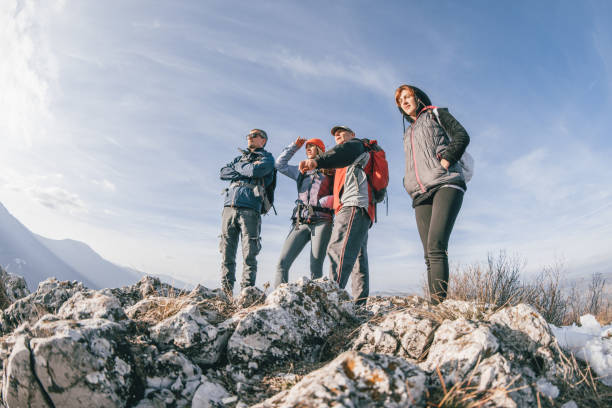 istock Friends enjoying the view from mountain top 889544846