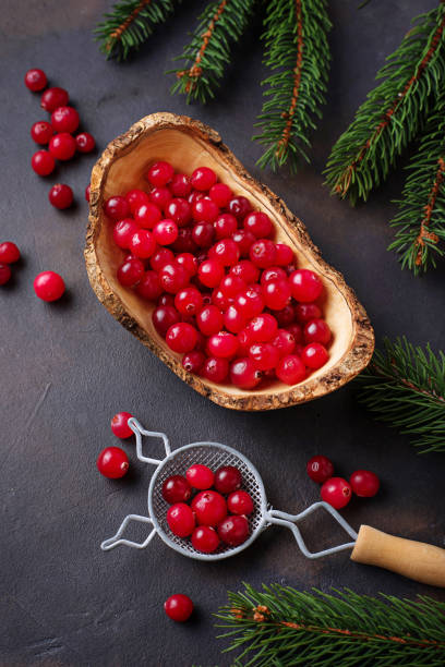 istock Fresh ripe cranberry in wooden bowl 889549470