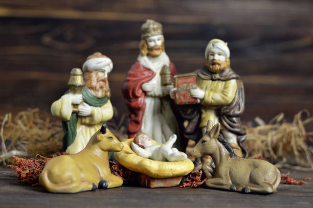 istock Nativity scene with three kings and baby Jesus 889559798