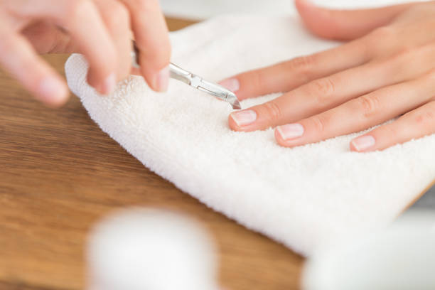 istock woman preparing french manucure 889563912