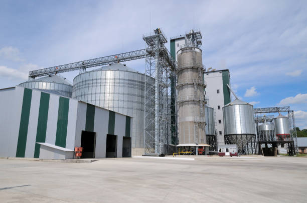 istock Agricultural Silos. Metal grain facility with silos. 889573684