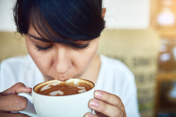 istock Sipping her way to happiness 889581514