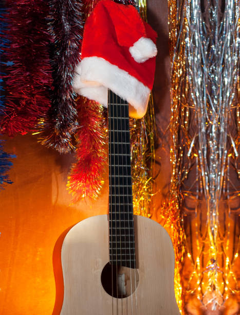 istock Classical guitar in the background of a Christmas background 889581830