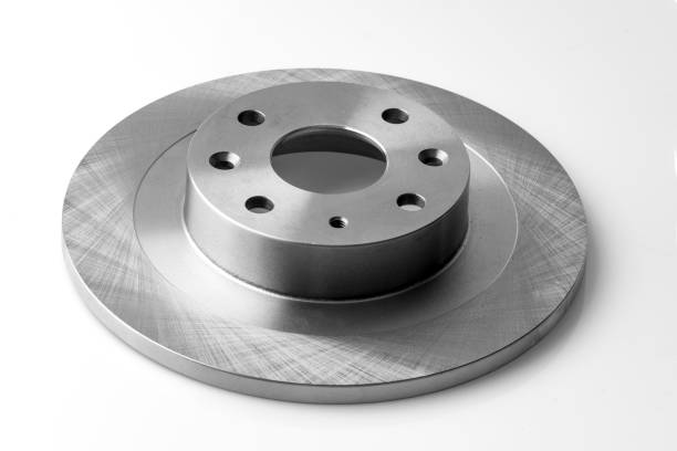istock New car brake disc and brake linings on white background 889581896