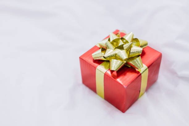 istock Red gift box with gold ribbon  for special occasions. 889581902