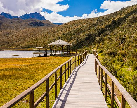 Wooden walkway crossing Limpiopungo Lagoon, Cotopaxi National Park, Ecuador