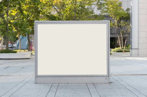Photo of Large blank billboard on a street wall,  banners with room to add your own text