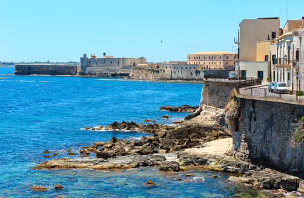istock Ortigia coast, Syracuse, Sicily, Italy. 889587812