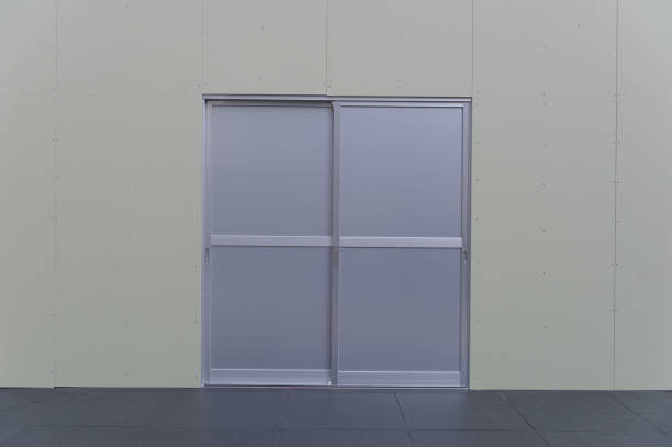 istock sidewalk by street wall & door 889606204