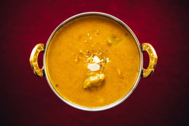 Lamb korma curry inside Karahi Indian Serving Dishes. North Indian food