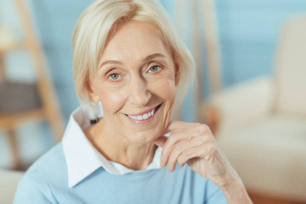 istock Adorable senior lady smiling while waiting for her daughter 889615648