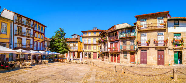 Sao Tiago Square Saint Tiago Square (Praca Sao Tiago) is the main square of historical center of Guimaraes, Portugal. braga district stock pictures, royalty-free photos & images