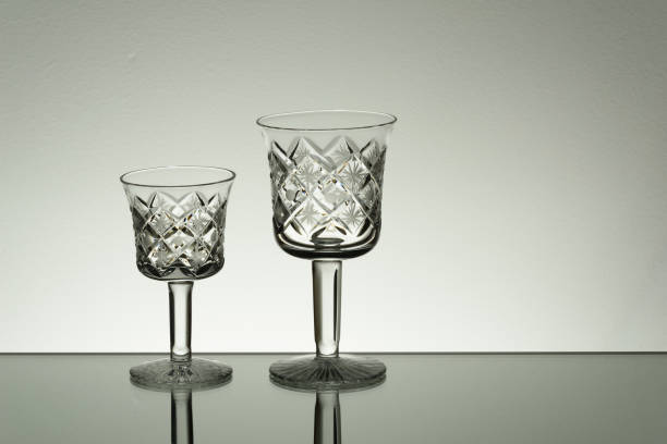 istock Glass on mirror and black background illuminated 889630676