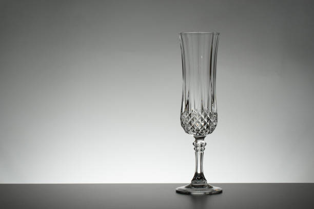 istock Glass on mirror and black background illuminated 889632958