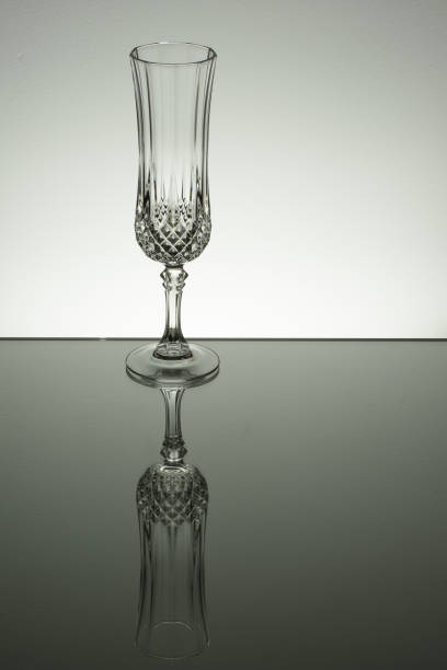istock Glass on mirror and black background illuminated 889635030