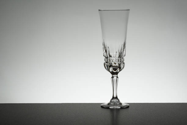 istock Glass on mirror and black background illuminated 889637482