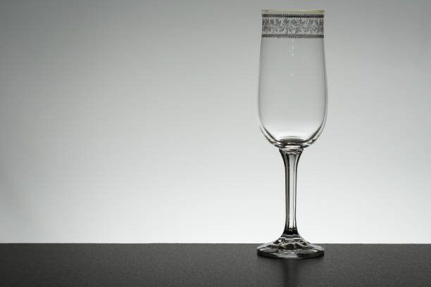 istock Glass on mirror and black background illuminated 889637590