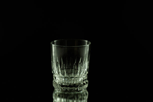 istock Crystal glass on black background 889641416