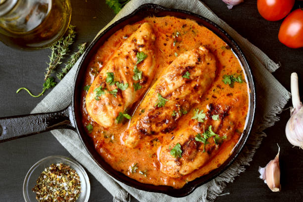 istock Chicken breast in tomato sauce 889654932