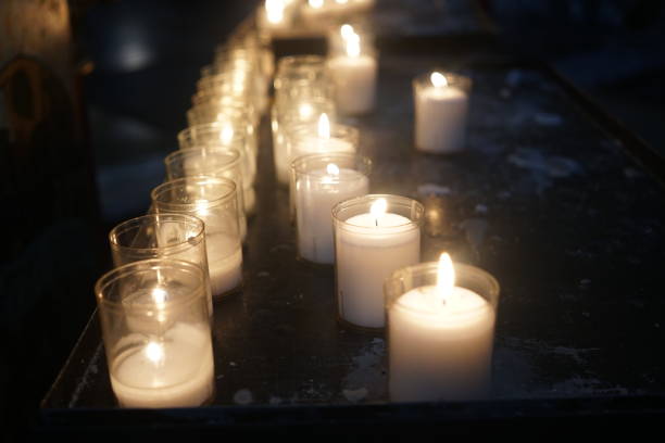istock Votive candles in church 889657400