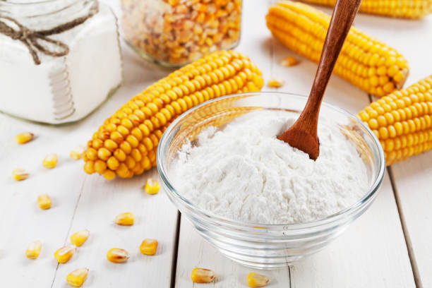 Cornstarch in the bowl Starch and corn cob on the table cornflower photos stock pictures, royalty-free photos & images