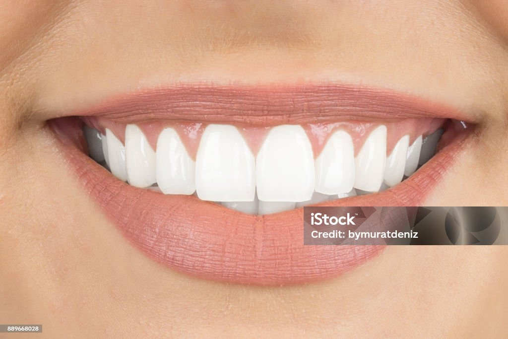 Beautiful smile with white teeth White Color Stock Photo