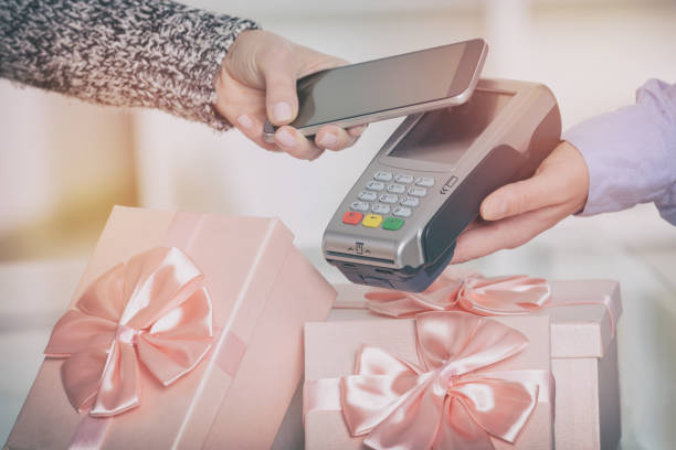 istock Paying contactless with smart phone 889679018