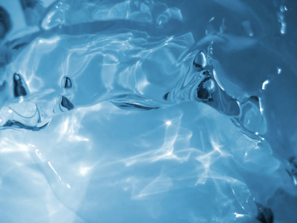 istock Blue ice and water natural background 889679460