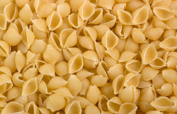 macarrones de la forma textura de conchas de mar - 5949 fotografías e imágenes de stock