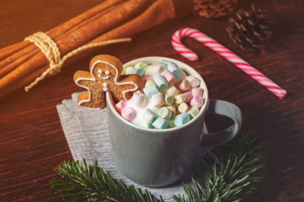 istock Mug containing Hot Chocolate, Marshmallows and Gingerbread Man 889700332