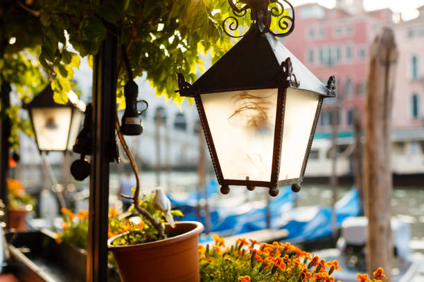 lantern by cafe on a grand canal venice italy - venice italy italy street italian culture imagens e fotografias de stock