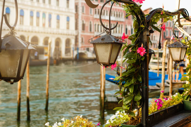 lantern by cafe on a grand canal venice italy - venice italy imagens e fotografias de stock