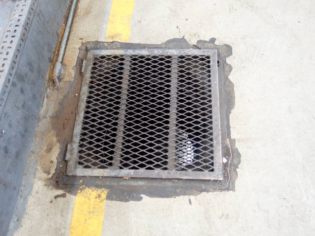 istock Steel sieve, footpath, drainage cover 889706454