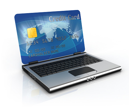 E-commerce, online shopping - laptop and credit card