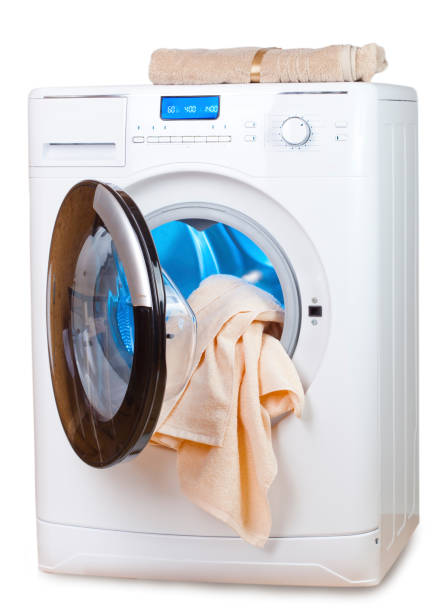 istock The washing machine with an open door and towels 889725392