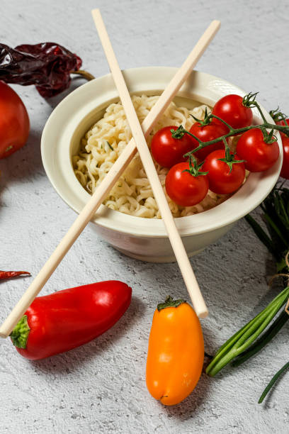 Noodles with vegetables. Typical oriental food