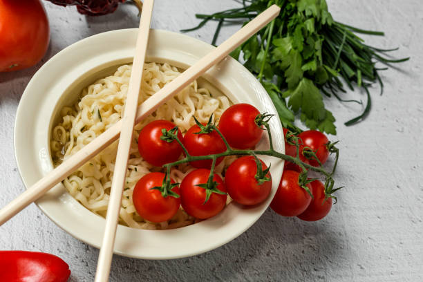 Noodles with vegetables. Typical oriental food