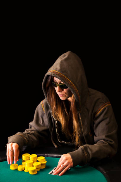 istock Woman Poker Player making a Bet 889751776