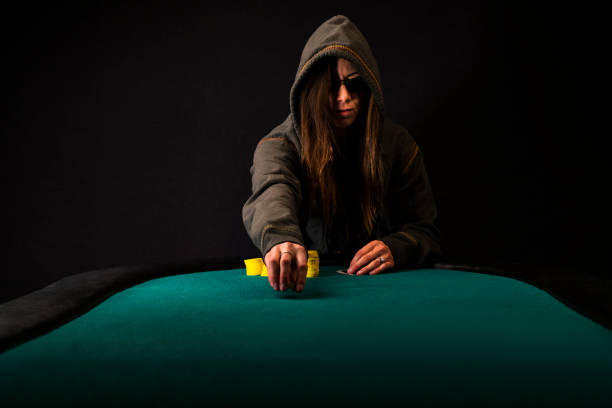 istock Woman Poker Player making a Bet 889752034